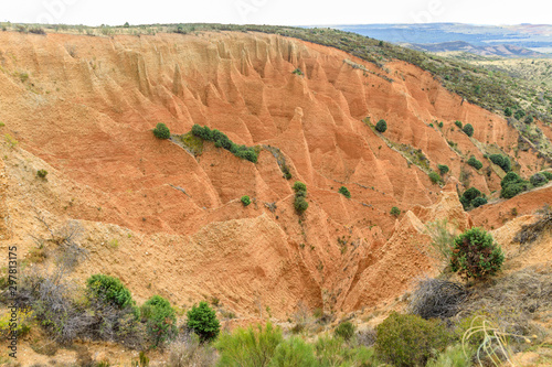 Tableau sur toile Valley eroded by rain and wind forming ravines in the red clay called Las Carcav