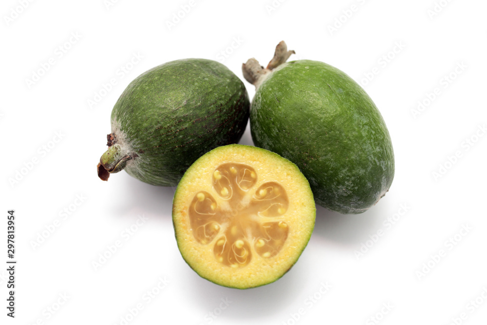 feijoa cut in half, on a white background close-up feijoa cut in half, on a white background close-up