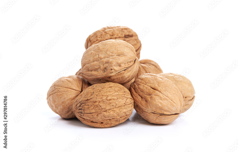 Heap of walnuts isolated on white background Heap of walnuts isolated on white background