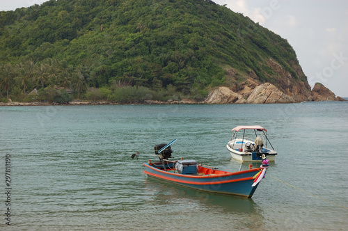 Two boats facing the Koh Ma island at Mae Haad Beach  Koh Phangan  Thailand