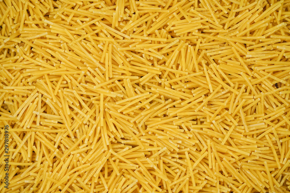 small pasta texture background closeup. vermicelli. raw small noodles small pasta texture background closeup. vermicelli. raw small noodles