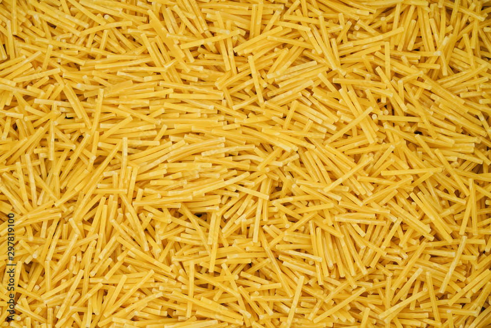 small pasta texture background closeup. vermicelli. raw small noodles small pasta texture background closeup. vermicelli. raw small noodles