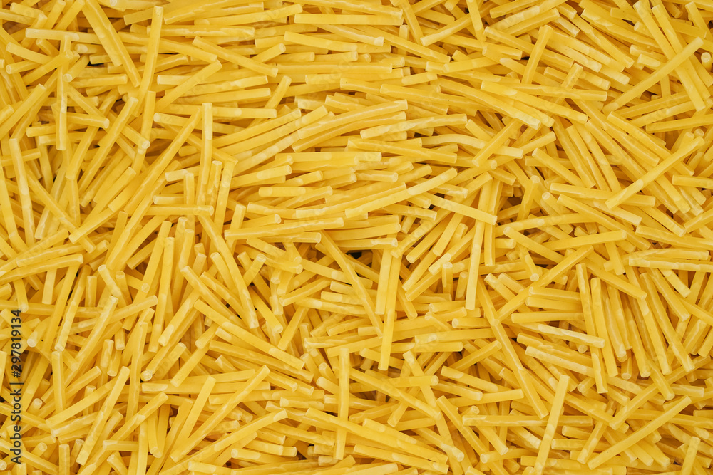 small pasta texture background closeup. vermicelli. raw small noodles small pasta texture background closeup. vermicelli. raw small noodles