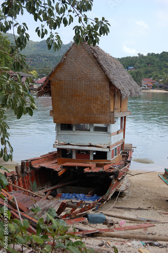 A broken boat at Chalok Baan Kao, Koh Tao, Thailand photo