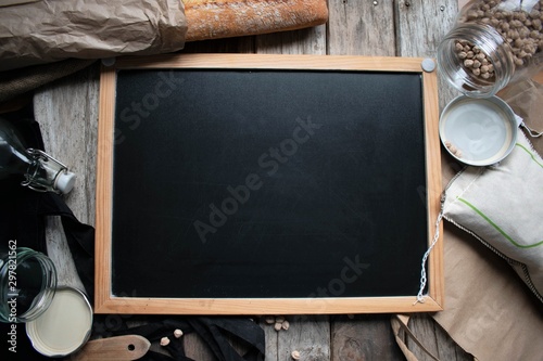 Blank blackboard with copy space. Natural food, flat lay.