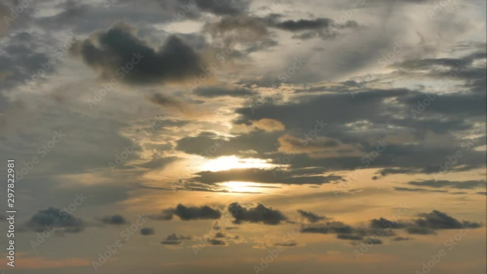 The black rain clouds were moving slowly at sunset time. The black rain clouds were moving slowly at sunset time.