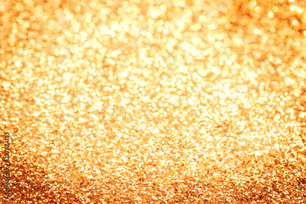 Golden festive glitter confetti bokeh background Golden festive glitter confetti bokeh background