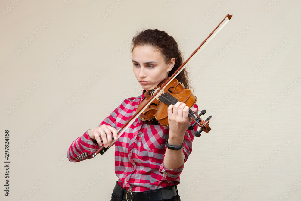 Amazing young brunette looking at notes, learning classical work Amazing young brunette looking at notes, learning classical work