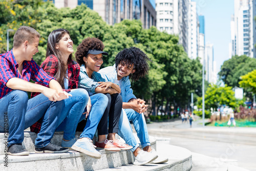 Photography Group of hispanic and african american hipster young adults in the city