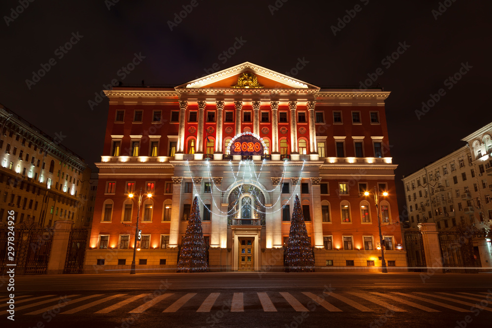Moscow city Hall building in Christmas decoration at night. Moscow, Russia