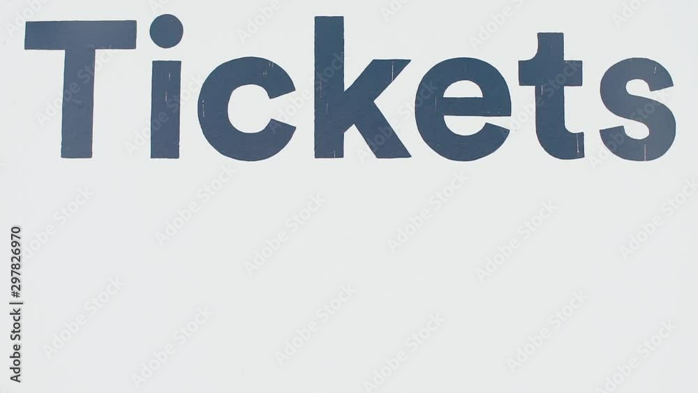 The inscription in blue, tickets at the ticket office of the station.