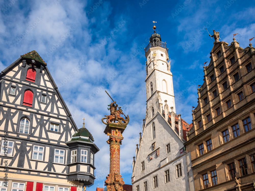 Half-timbered houses and Rathaus buildings at Marktplatz Rothenburg ob der Tauber Old Town Bavaria Germany