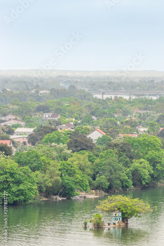 a shrine on a very small Island in the perfume river in Hue, Vietnam.