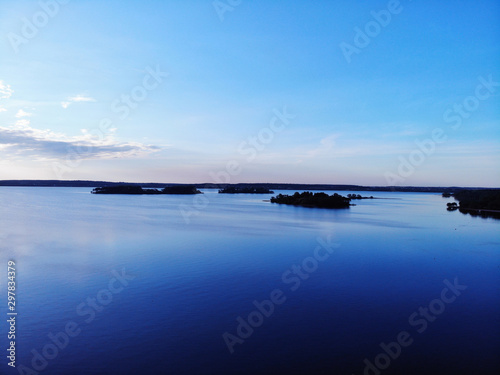 Blue sunset sky over lake