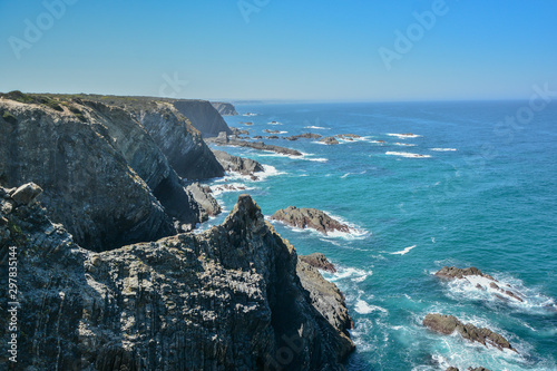 beautiful landscape of atlantic sea with rocks and waves and ocean floor, copy-space