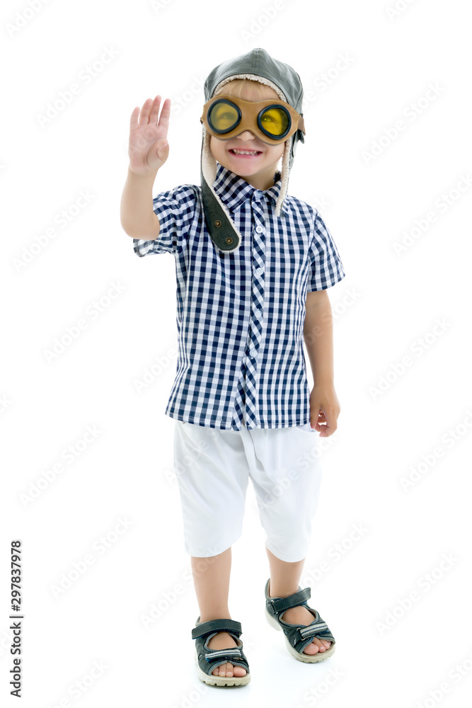 Cute little boy in helmet pilot. Cute little boy in helmet pilot.