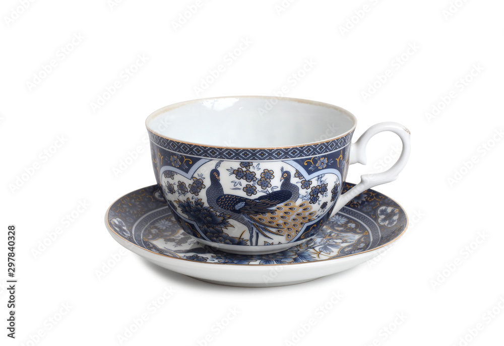 Antique porcelain tableware for tea on a white background Antique porcelain tableware for tea on a white background