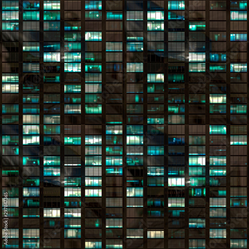 .265/5000.Building facade at night with some windows illuminated and some not. Urban night detail.