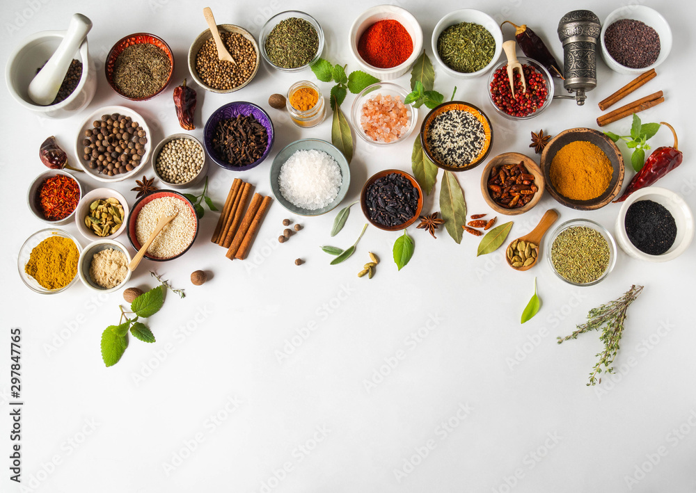 Various dry spices in small bowls and raw herbs flat lay on white background. Top view, copy space - obrazy, fototapety, plakaty 