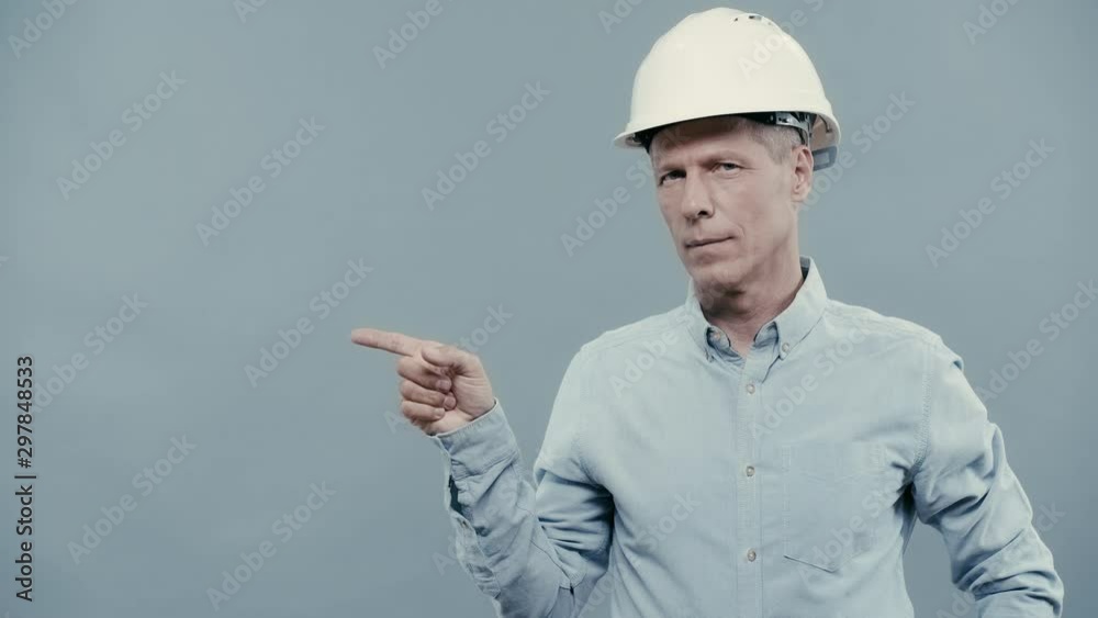 smiling architect in helmet showing thumb up smiling architect in helmet showing thumb up