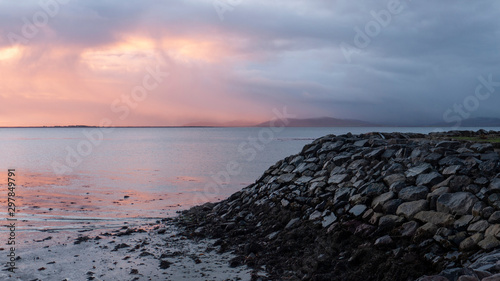 Galway Bay  Ireland at dawn with view across to the Burren. Taken from Salthill beach in the early morning at sunrise