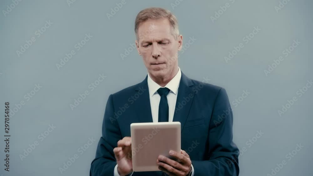 businessman showing digital tablet with green screen businessman showing digital tablet with green screen
