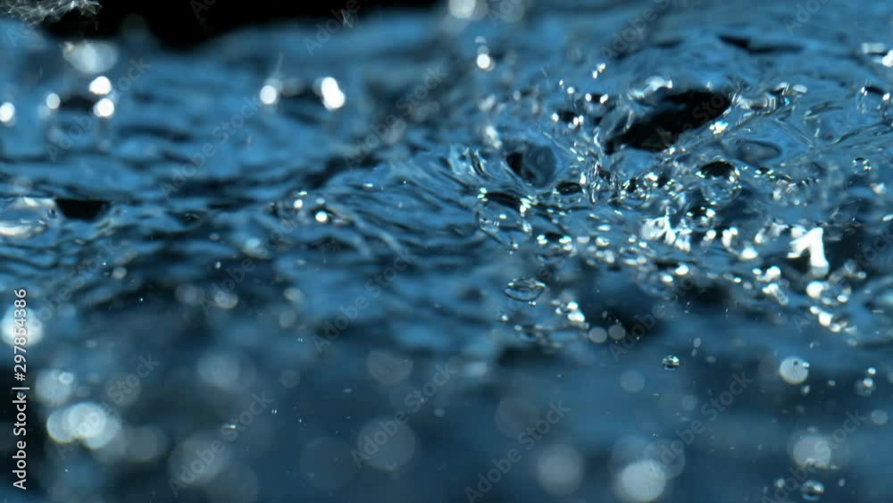 Super Slow Motion Shot of Blue Water Background at 1000 fps.