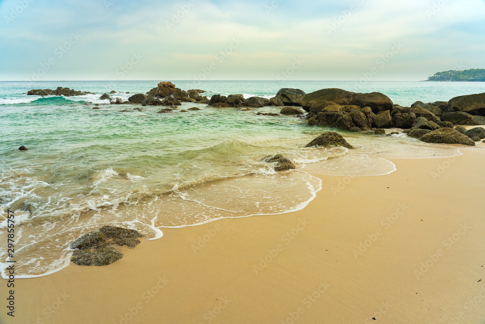 Seashell rocks beach millions of years old on the coast at Phuket Thailand.