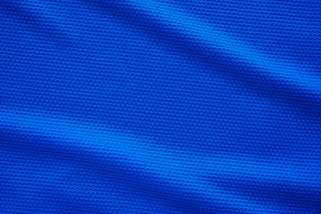 Blue football jersey clothing fabric texture sports wear background, close up top view