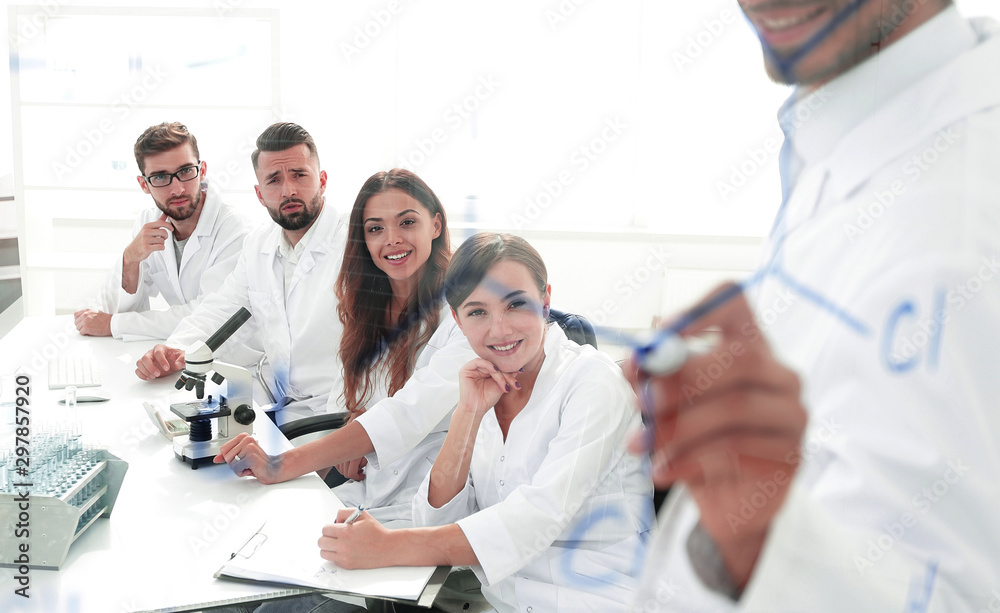 view through the transparent Board. a scientist makes a report. view through the transparent Board. a scientist makes a report.