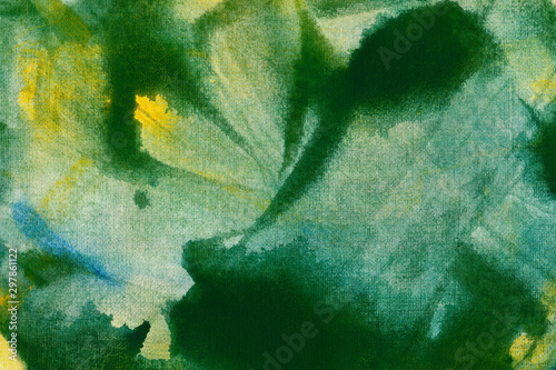 Abstract green and yellow watercolor background. The color splashing in the paper. Acrylic painting texture.