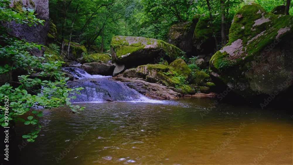 Small waterfall in middle of big forest Small waterfall in middle of big forest