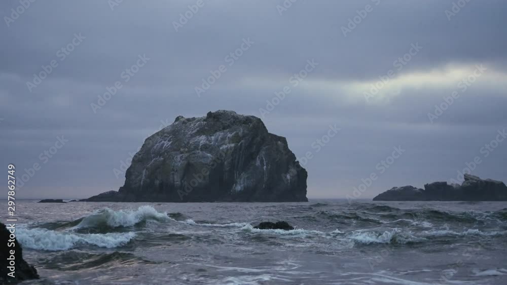 Face Rock zoom in along Oregon coast on cloudy day