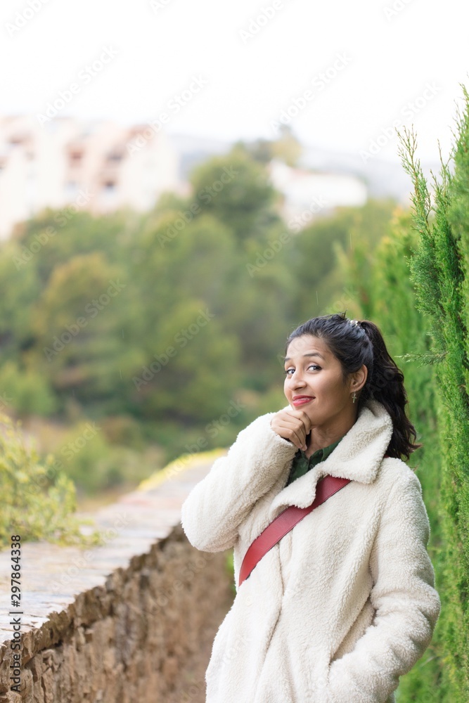 Young indian woman on a nature place Young indian woman on a nature place
