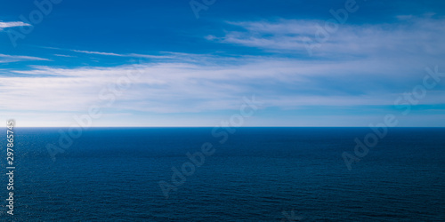 blue sky and sea as far as the horizon goes 