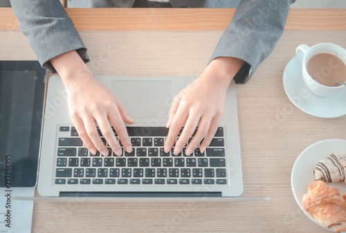 business woman working typing laptop computer