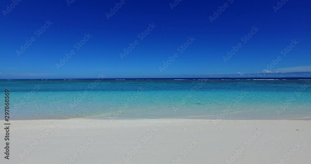 The wide shoreline and calm sea Beau Vallon beach, Seychelles, Victoria, Mahe's northwest coast The wide shoreline and calm sea Beau Vallon beach, Seychelles, Victoria, Mahe's northwest coast