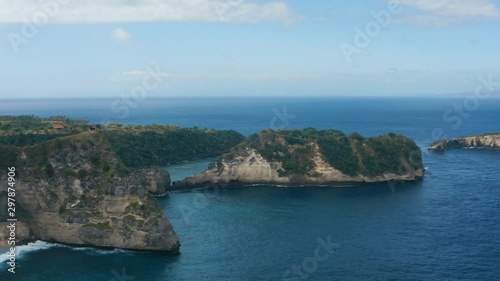 Aerial shot of beautiful rocks on the sea. Nusa Penida Island. photo