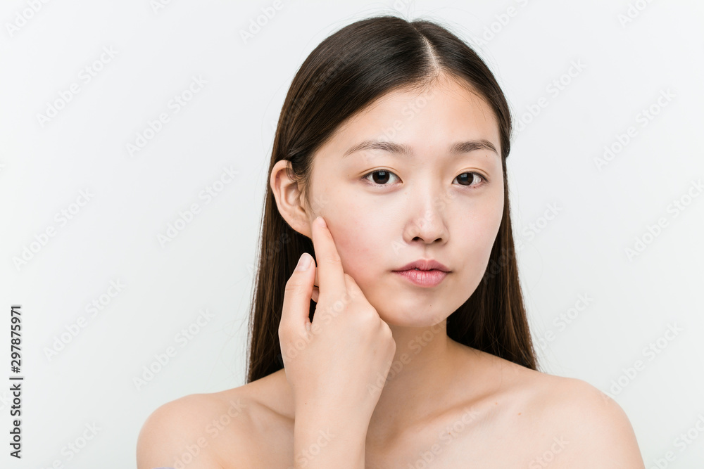 Close up of a young beautiful and natural asian woman Close up of a young beautiful and natural asian woman