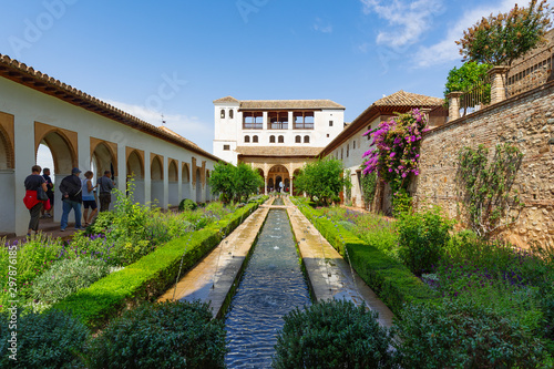 Alhambra. Water and coolness of Generalife Garden on a sunny hot day. © ANDREI