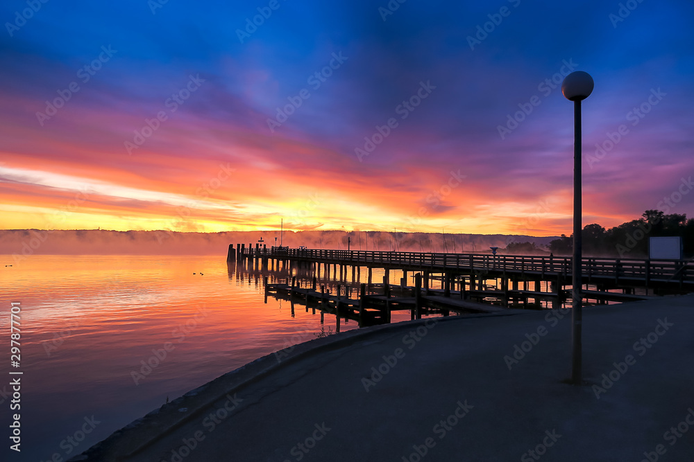 sunrise at lake Ammersee Diessen beach promenade