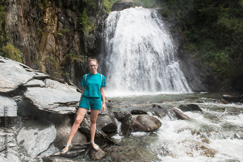 Woman at Korbu Waterfall on...