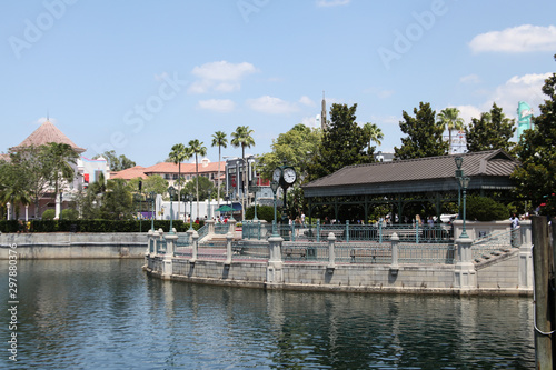 Orlando, Florida, USA - October 26, 2019: Downtown Celebration, a community originally developed by The Walt Disney Company. Modern buildings around Lake Eola Park, gardens and sculptures.