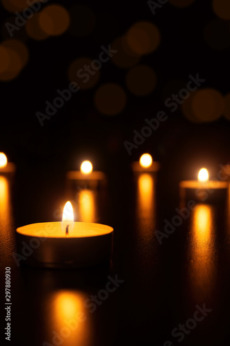 Christmas Candles flame light romantic decoration in defocused lights