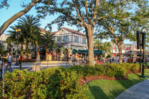 Orlando, Florida, USA, September 5, 2019: The modern building structure and landscaping of the Florida Theme Park, with people from all over the world enjoying the vacation.