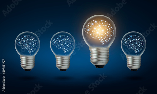 different Light bulb idea Many bulbs are arranged in a row and one of them is illuminated. Concept idea photo