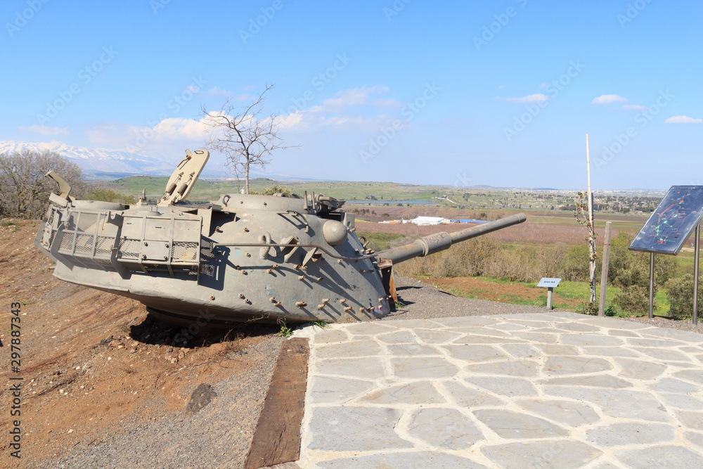 Yom Kippur War memorial at quineitra viewpoint on Golan Heights with Israeli tank turret aiming towards Syria Yom Kippur War memorial at quineitra viewpoint on Golan Heights with Israeli tank turret aiming towards Syria