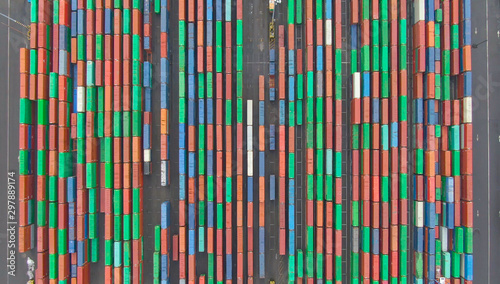 Fényképezés TOP DOWN Flying high above long rows of colorful shipping containers in LA docks