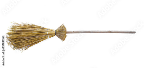 straw broom for sweeping on a white background photo