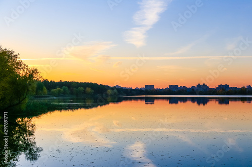 Autumn. Autumn colors. Sunset on the lake. Kiev.